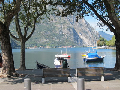 Lecco and the shore of Lake Como. Quiite beautiful. We stopped here for lunch in a cafe right next to a girls college where the students were just leaving for lunch.<br />Bratty had spent the morning burning extra fuel in the tunnels around the Lake revving the nuts off his bike and making lots of noise.